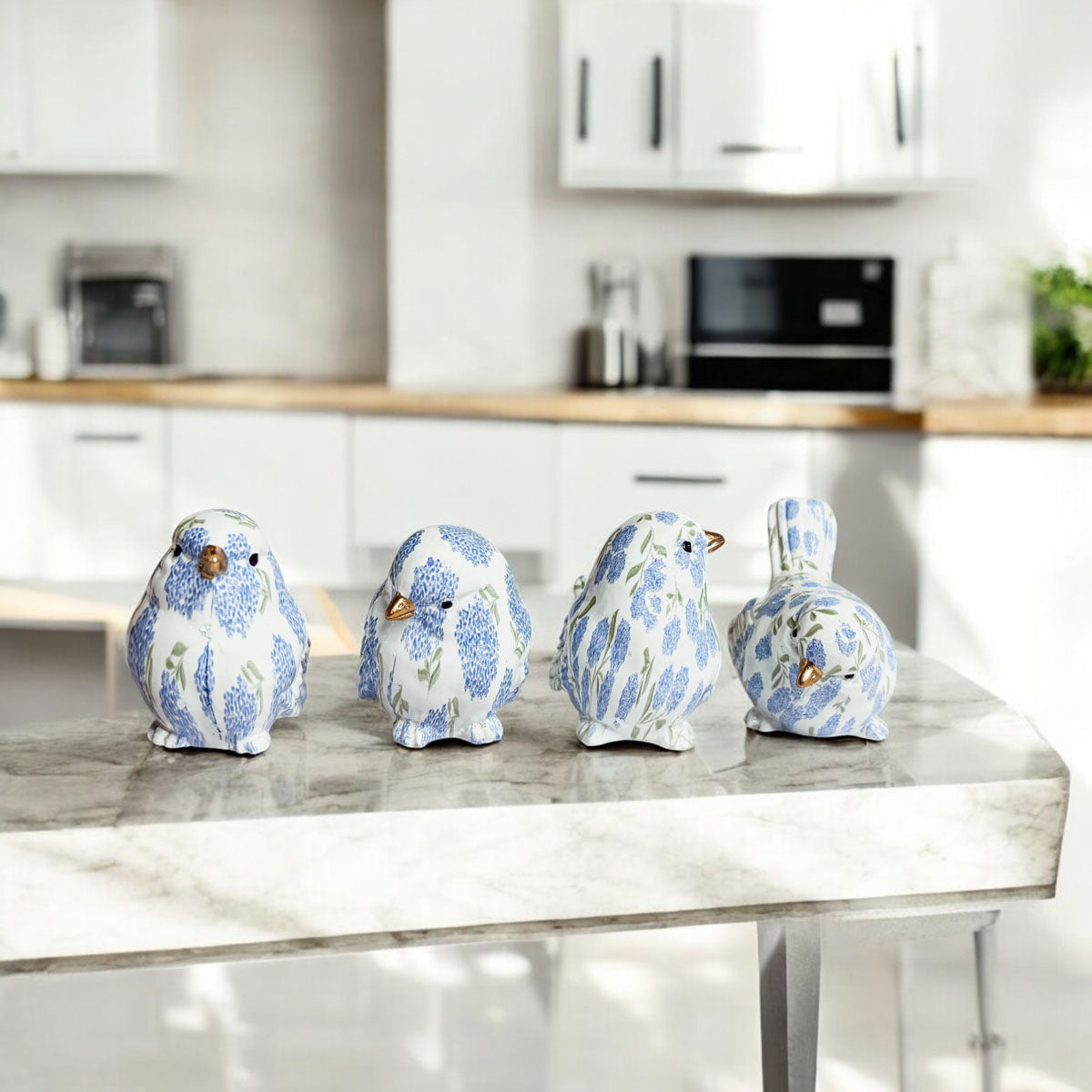Close-up of small resin blue hydrangea bird figurine showcasing intricate details and craftsmanship