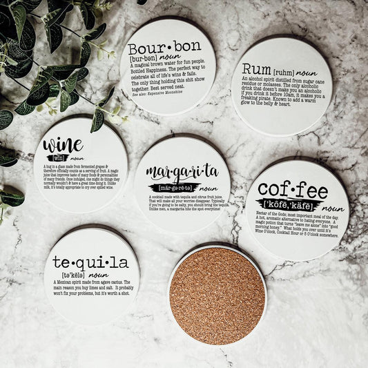 Complete set of drink definition ceramic coasters with cork backing
Bar cart coaster collection featuring funny drink definitions