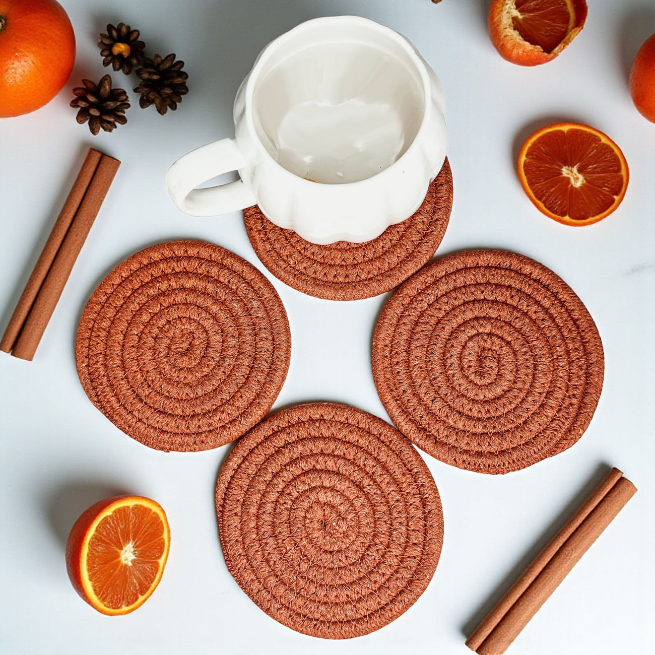Holiday entertaining braided rope coasters gift set neutral tones
Braided rope drink coasters fall colors gift set 4 piece
giftable coaster set tied with jute ribbon for holiday giving
