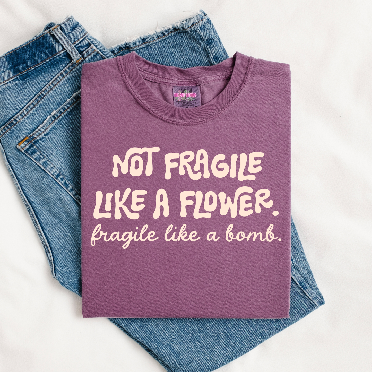 Not Fragile Like a Flower Graphic Tee or Crewneck Sweatshirt