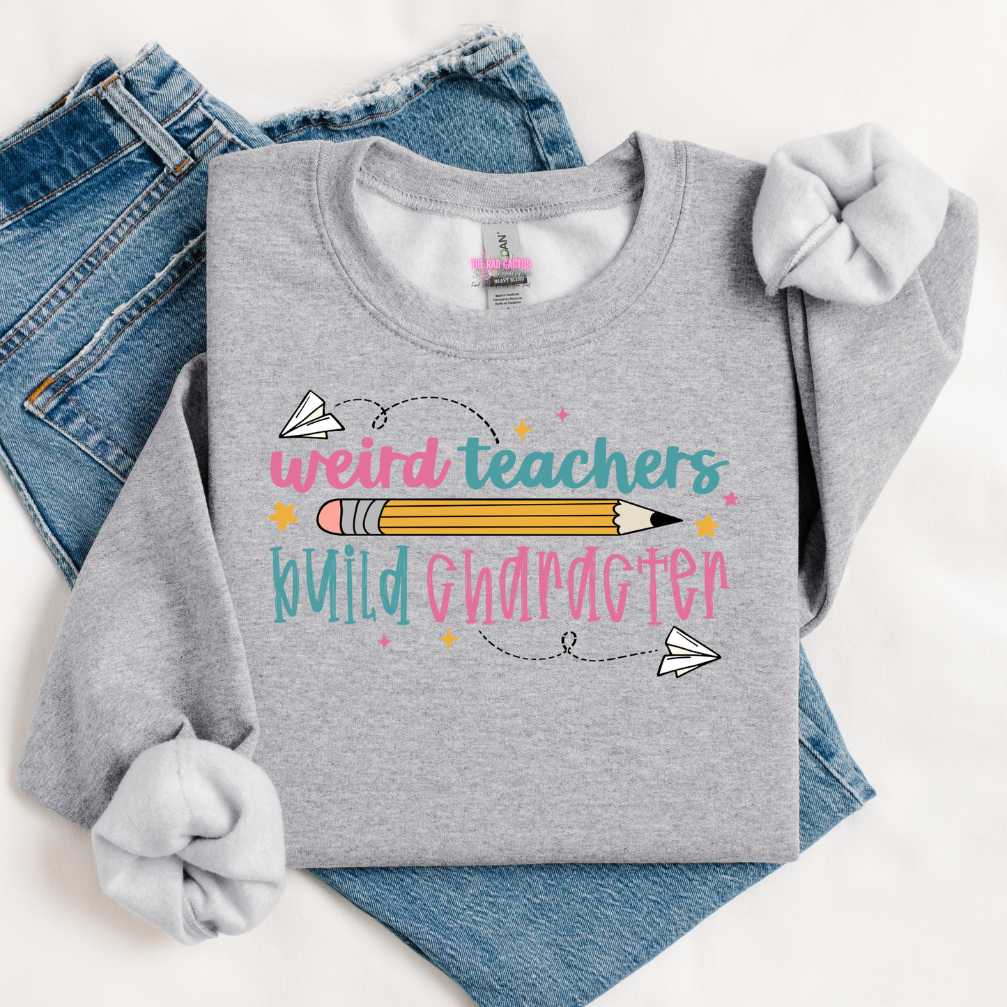 Weird Teachers Build Character Graphic Tee or Crewneck Sweatshirt