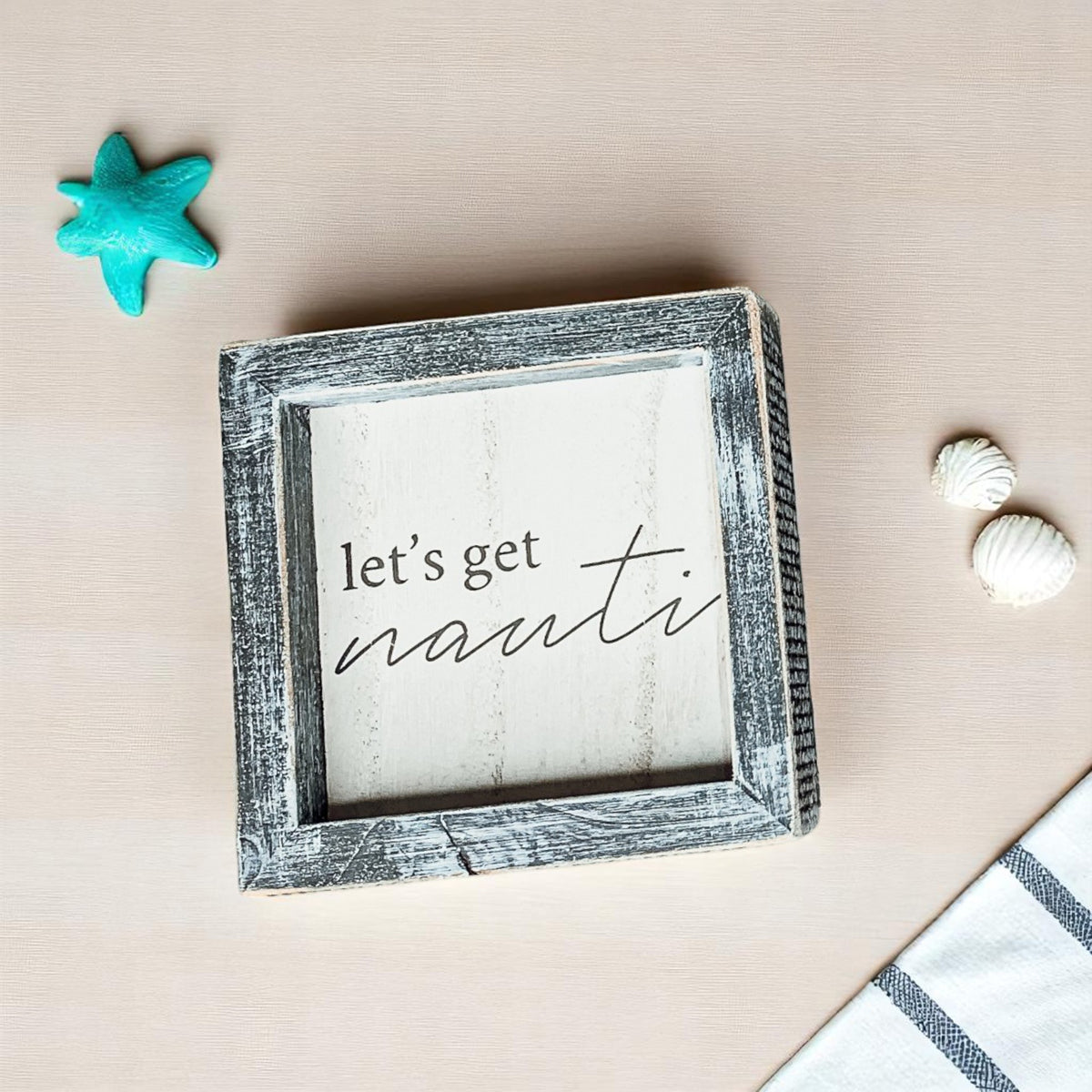 Gray framed nautical quote sign for coastal decor
Nautical quote wooden sign in 5x5 distressed gray frame with beach decor accents