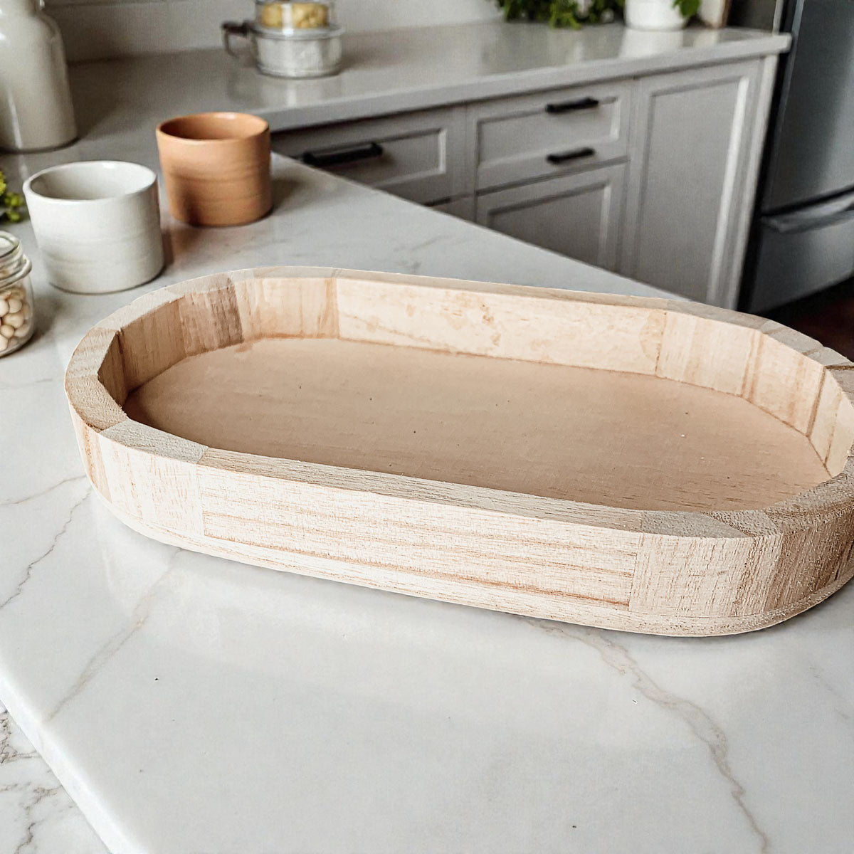 rustic wooden tray styled with pink flowers
natural wood decorative tray for shelf styling
oval wood trinket tray for modern rustic decor
lightweight Paulownia wood catchall for small items