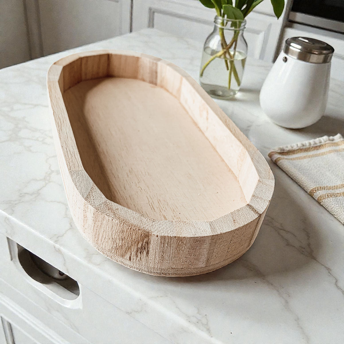 natural Paulownia wood tray for ring and watch storage
farmhouse decor wooden catchall on marble countertop
eco friendly wooden trinket tray gift for her
handmade wooden tray for nightstand clutter
narrow wooden bowl for remote control storage