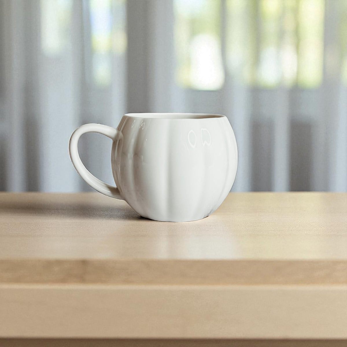Autumn housewarming gifts - white and orange pumpkin coffee cups
