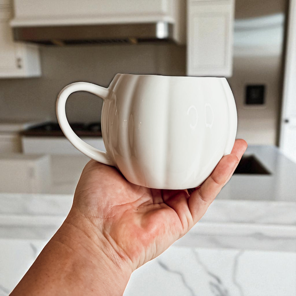 Thoughtful fall presents - ceramic pumpkin coffee mugs for autumn gift giving
Halloween hostess gifts - pumpkin shaped ceramic mugs for seasonal entertaining