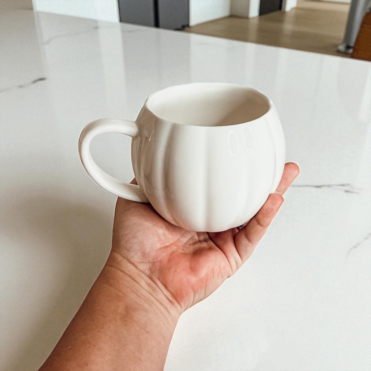 September fall decor - ceramic pumpkin coffee mugs for autumn home styling
October Halloween prep - pumpkin shaped coffee cups for seasonal decorating