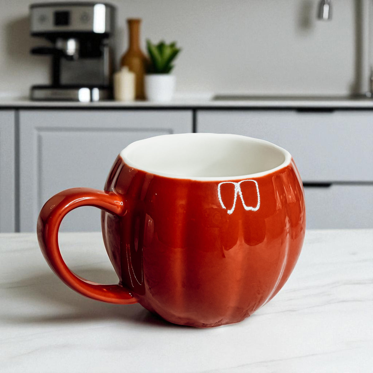 White and orange pumpkin shaped ceramic coffee mugs - handmade fall kitchen decor gifts
Fall harvest pumpkin coffee mugs - unique Halloween home decor ceramic drinkware