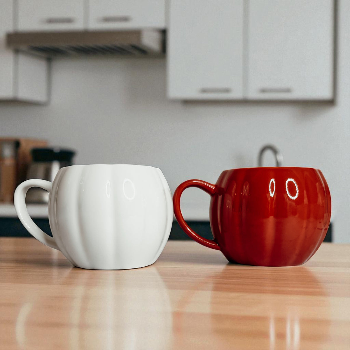 Unique fall home decor gifts - white and orange pumpkin coffee mugs for seasonal decorating
