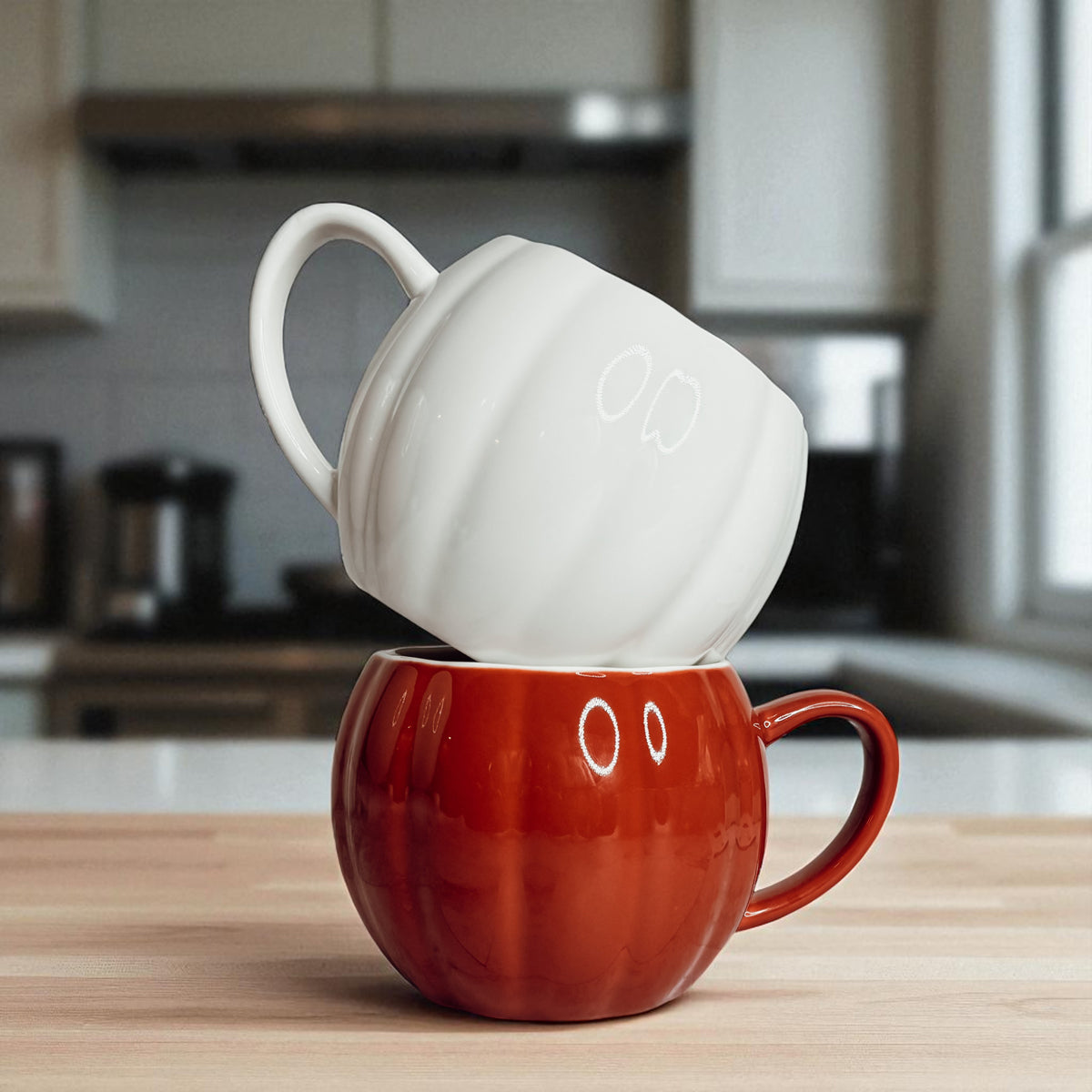 Fall kitchen decor - ceramic pumpkin shaped coffee mugs for Halloween home styling
Seasonal home accessories - white and rust orange pumpkin coffee mugs for fall decorating