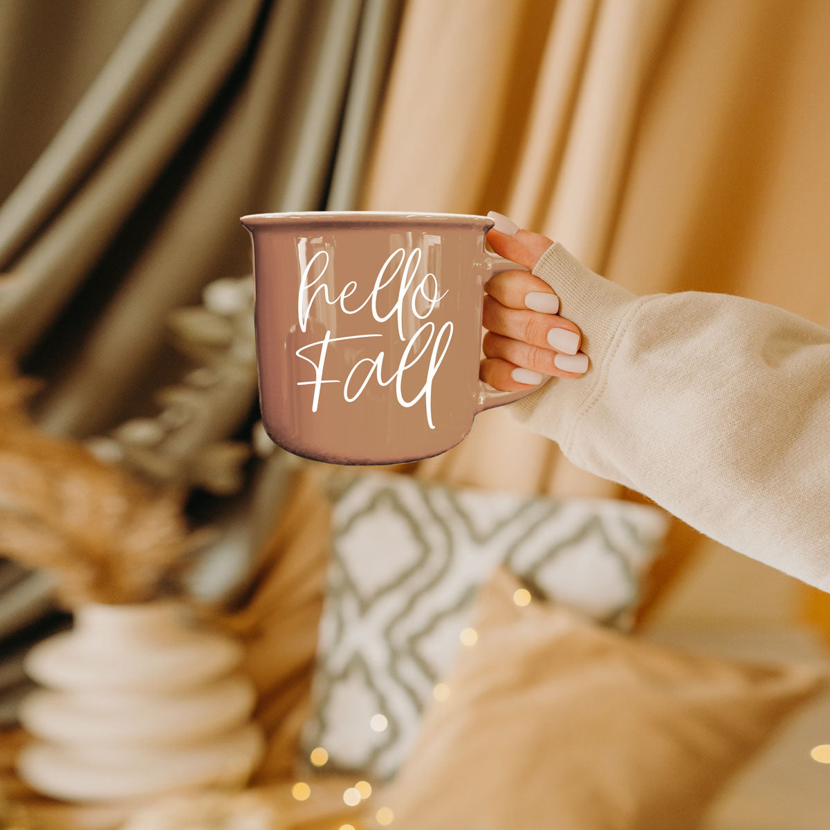 hello fall mug in fall home office setup
hello fall coffee cup next to pumpkin bread
hello fall mug as part of fall gift box
